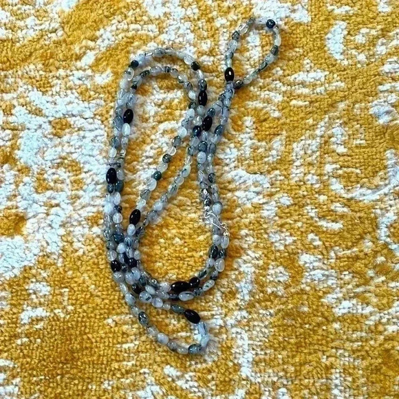 The Flapper” My name is Sandra Austin, I have created a  Single strand, long, mixed quartz flapper necklace NWT